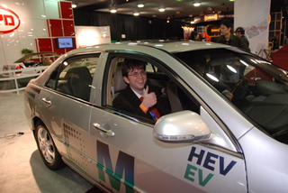 Illustration for article titled Detroit Auto Show: World Exclusive Surreal, Illegal Test Drive Of Chinese Hybrid Through Cobo Arena